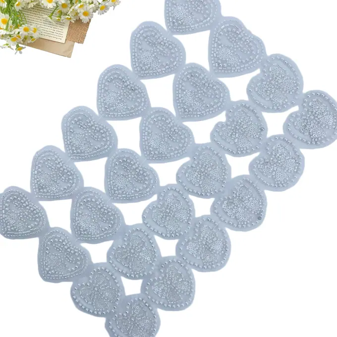 White beaded heart motif trim · MET-1002 — product view