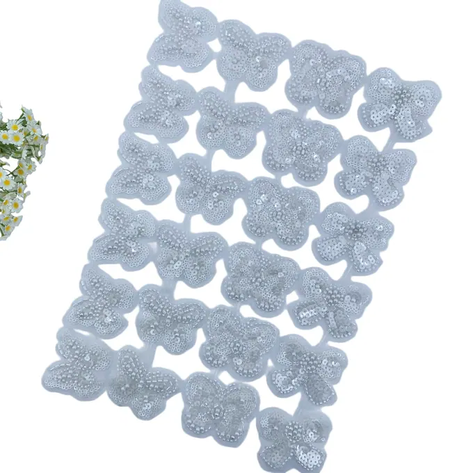 White beaded butterfly trim · MET-1004 — product view