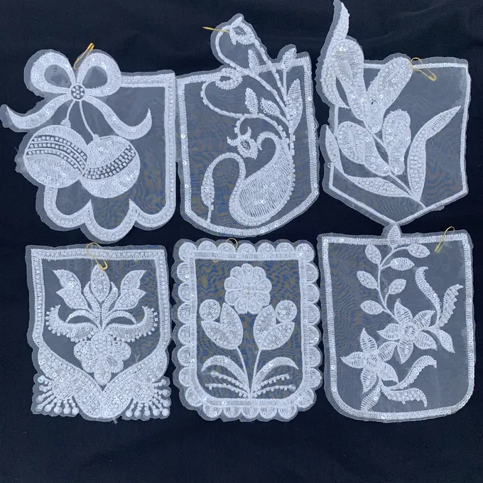Embroidered pocket motif collection · MET-4005 — product view
