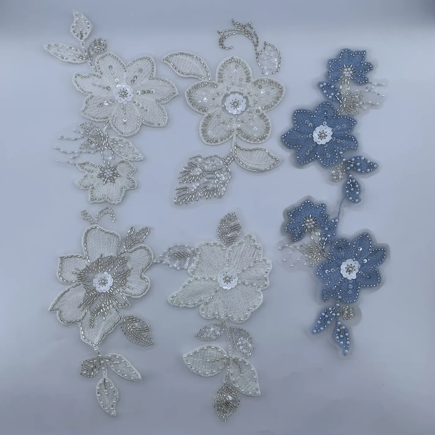 White floral branch appliqués · MET-4022 — product view