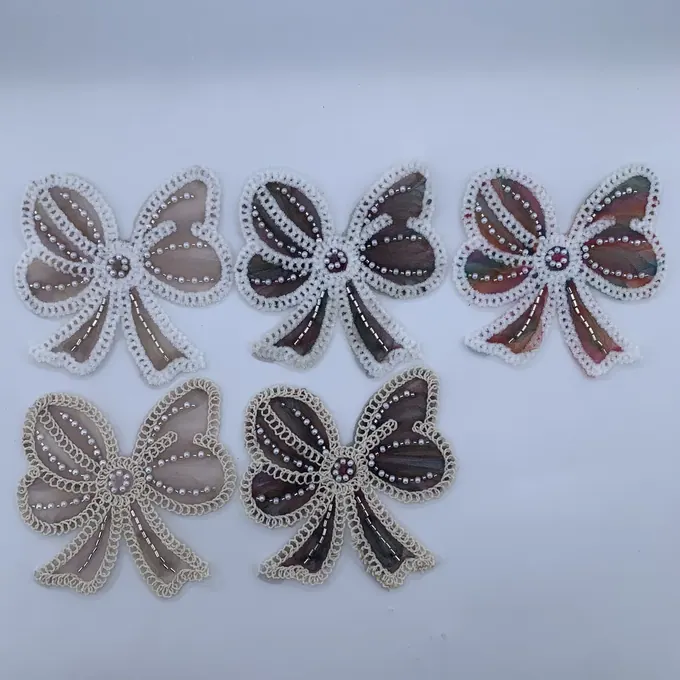 Petal-shaped bow appliqué · MET-4036 — product view