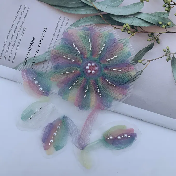 Dimensional bloom and leaf appliqué · MET-4052 — product view