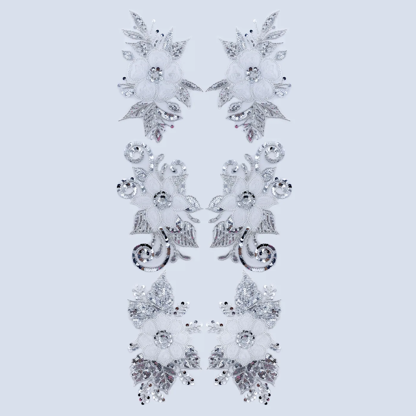 Paired silver floral and leaf appliqués · MET-5001 — product view