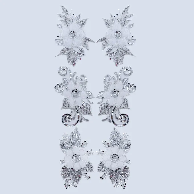 Paired silver floral and leaf appliqués · MET-5001 — product view