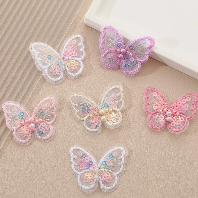 Single-layer embroidered butterfly appliqué · MET-8019 — product view