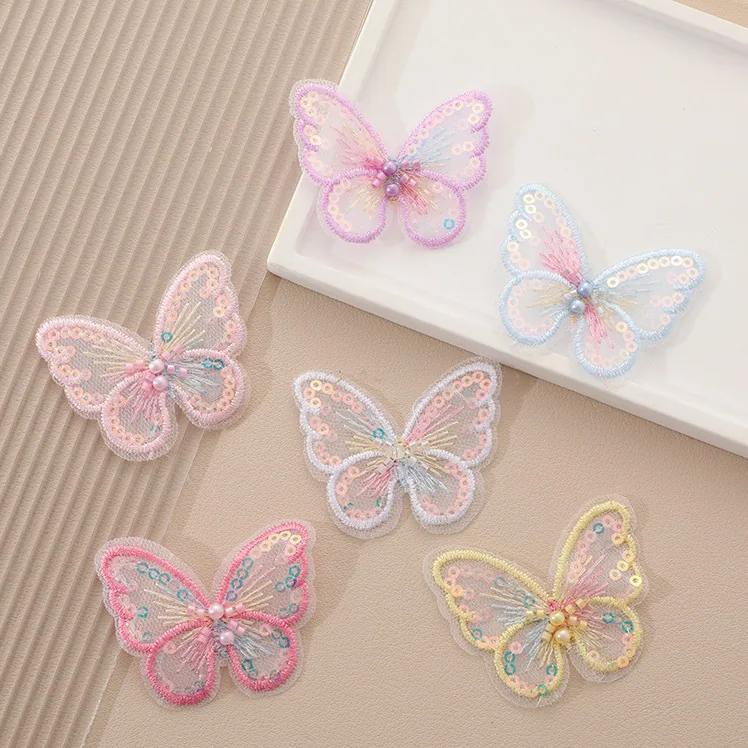 Single-layer embroidered butterfly appliqué · MET-8024 — product view