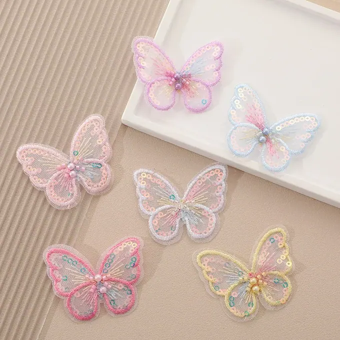 Single-layer embroidered butterfly appliqué · MET-8024 — product view