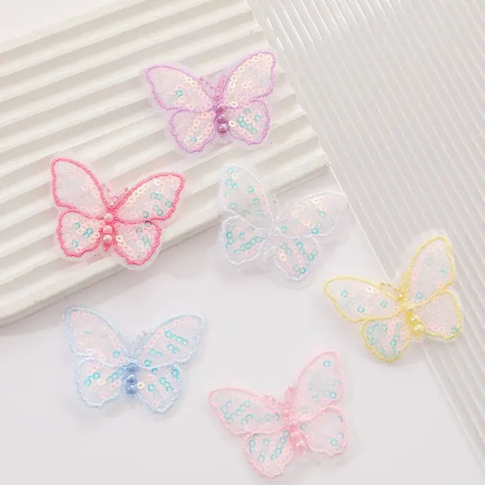 Single-layer embroidered butterfly appliqué · MET-8034 — product view