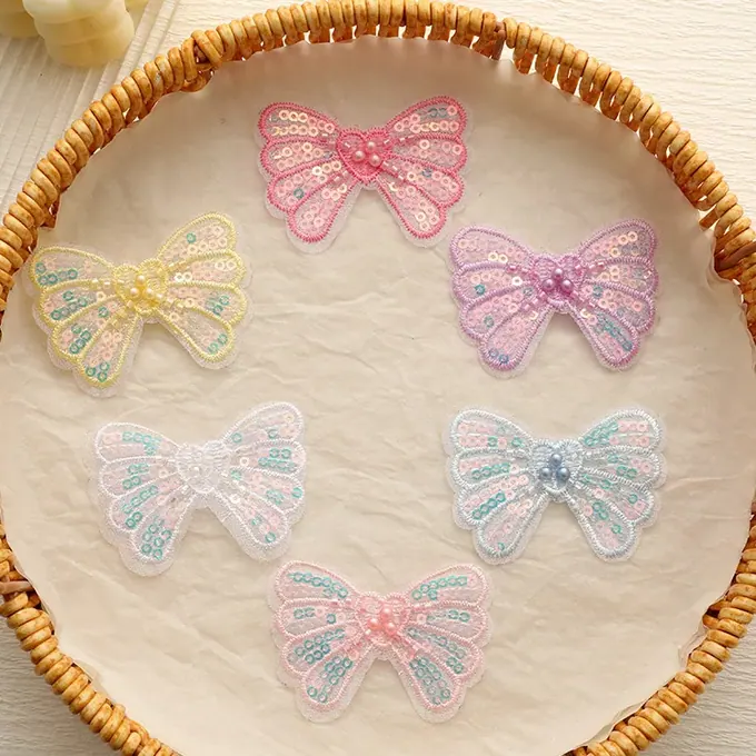 Single-layer embroidered butterfly appliqué · MET-8038 — product view