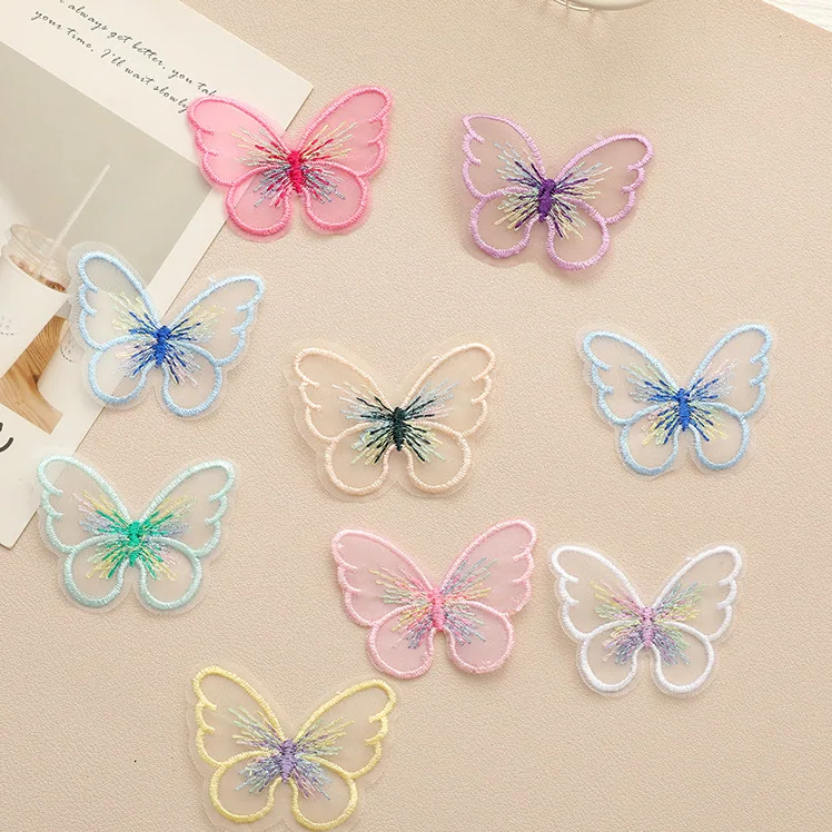 Pastel single-layer embroidered butterfly appliqué · MET-8040 — product view