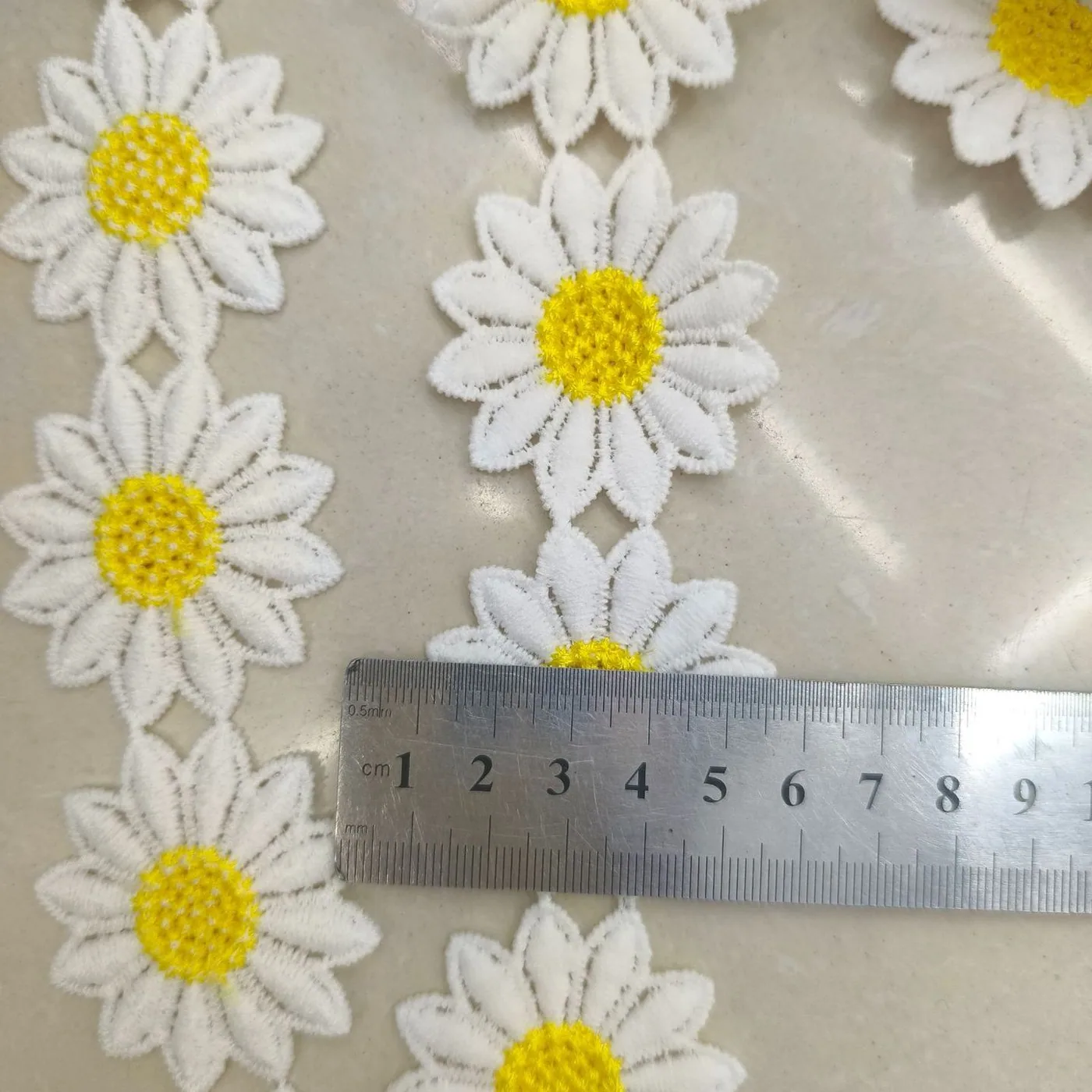 Floral embroidered trim · MET-8046 — ruler reference