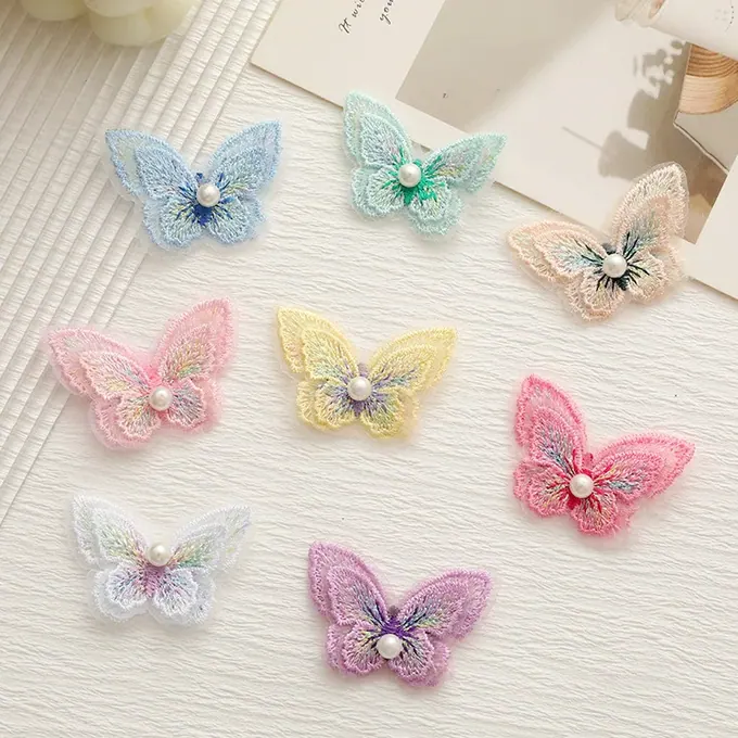 Layered embroidered butterfly appliqué · MET-8047 — product view