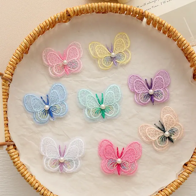 Layered embroidered butterfly appliqué · MET-8049 — product view