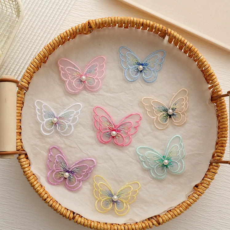 Pastel layered embroidered butterfly appliqué · MET-8051 — product view
