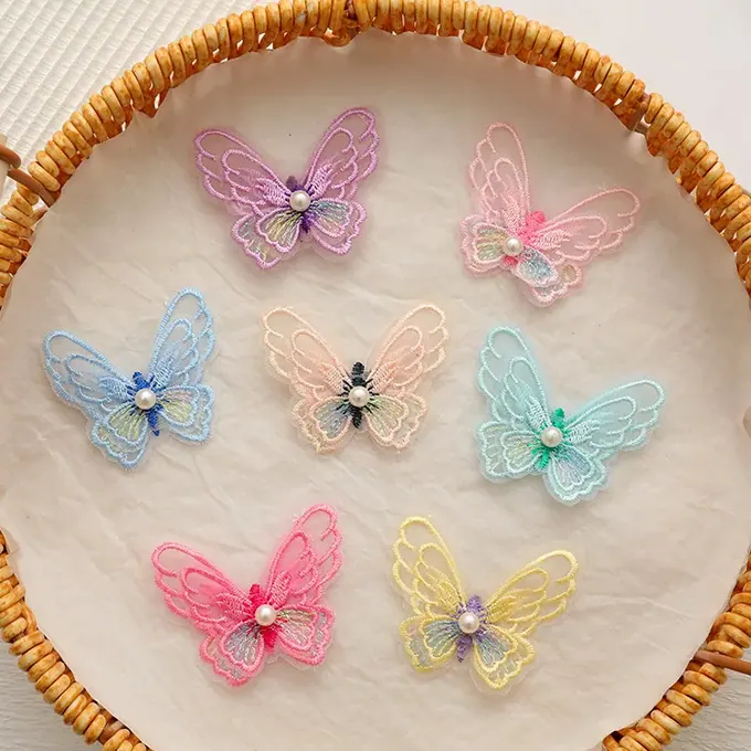 Pastel layered embroidered butterfly appliqué · MET-8053 — product view