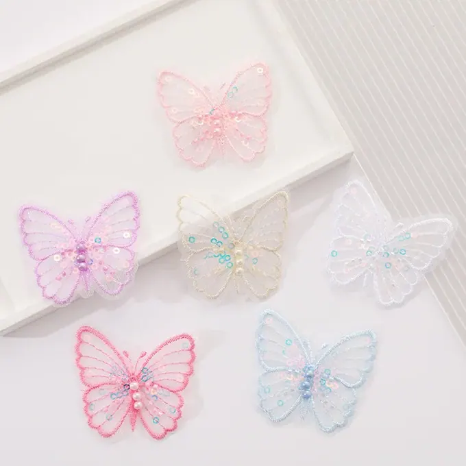 Single-layer embroidered butterfly appliqué · MET-8072 — product view