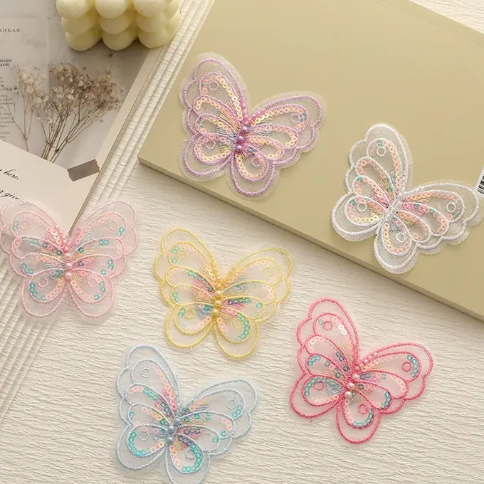 Single-layer embroidered butterfly appliqué · MET-8078 — product view