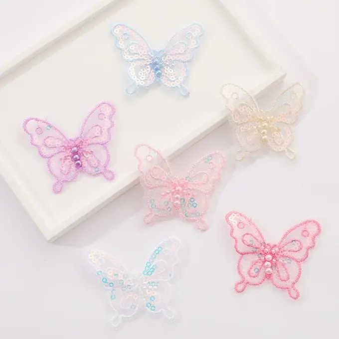 Single-layer embroidered butterfly appliqué · MET-8082 — product view