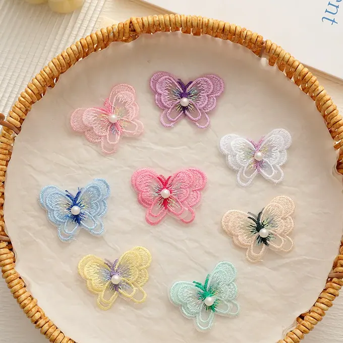 Pastel layered embroidered butterfly appliqué · MET-8096 — product view